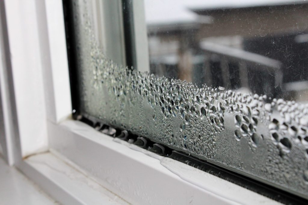 Home with condensation and poor airflow being assessed for a PIV system