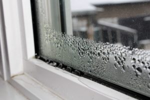 Home with condensation and poor airflow being assessed for a PIV system