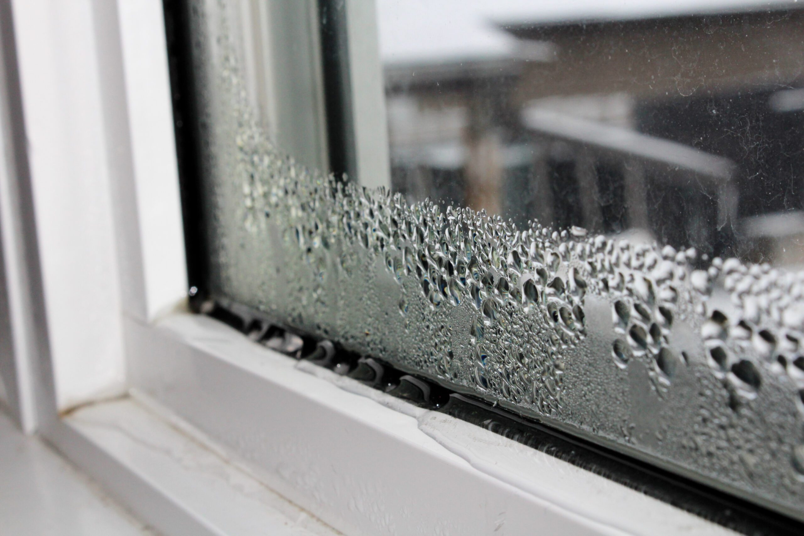 Home with condensation and poor airflow being assessed for a PIV system